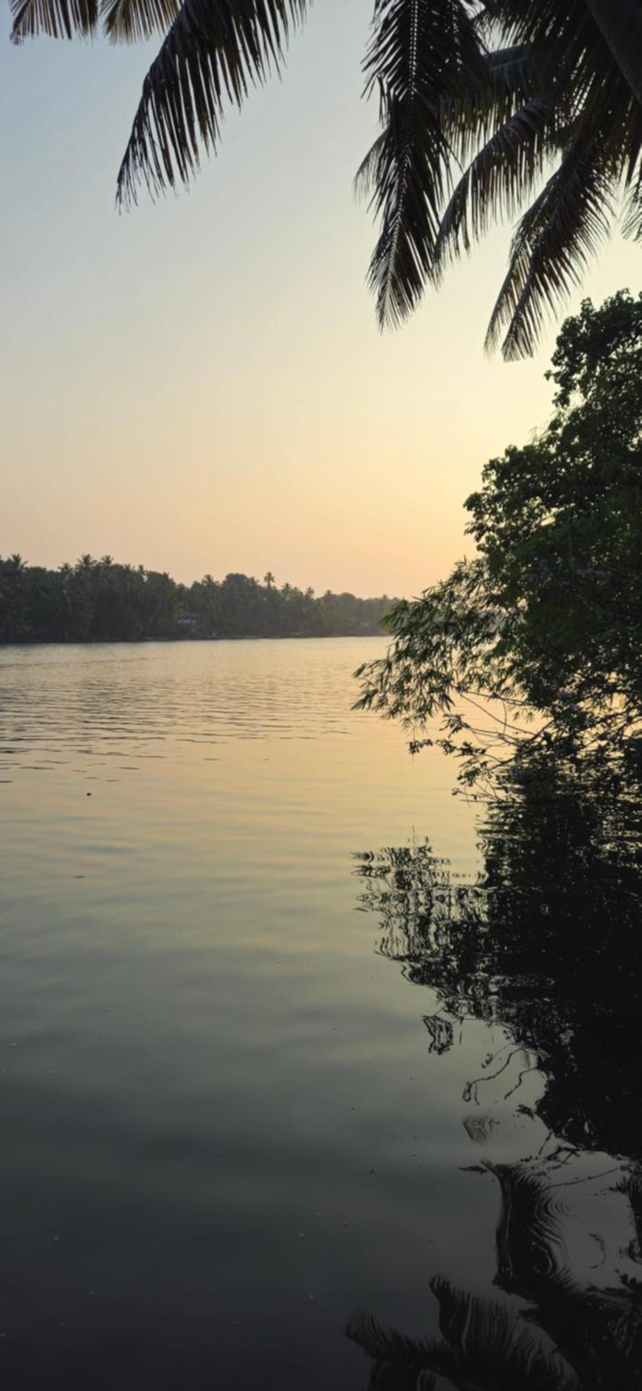 Islandstay-A Riverside Property Kollam Esterno foto